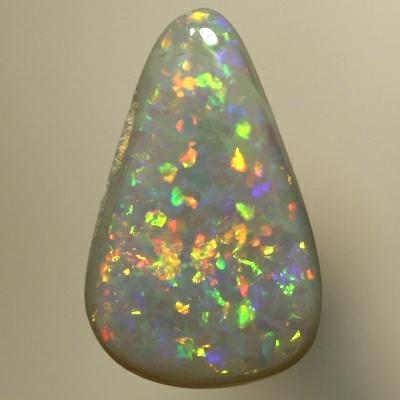 SOLID SEMI BLACK OPAL Sparkles of red, orange, green and blue